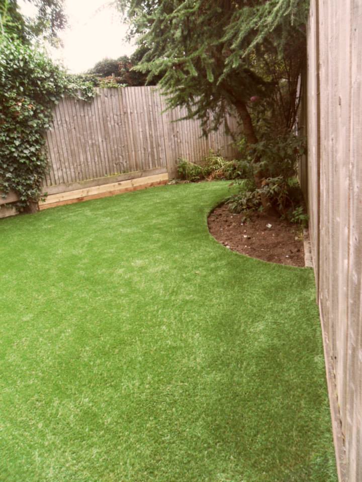 An artificial grass lawn in a Surrey garden