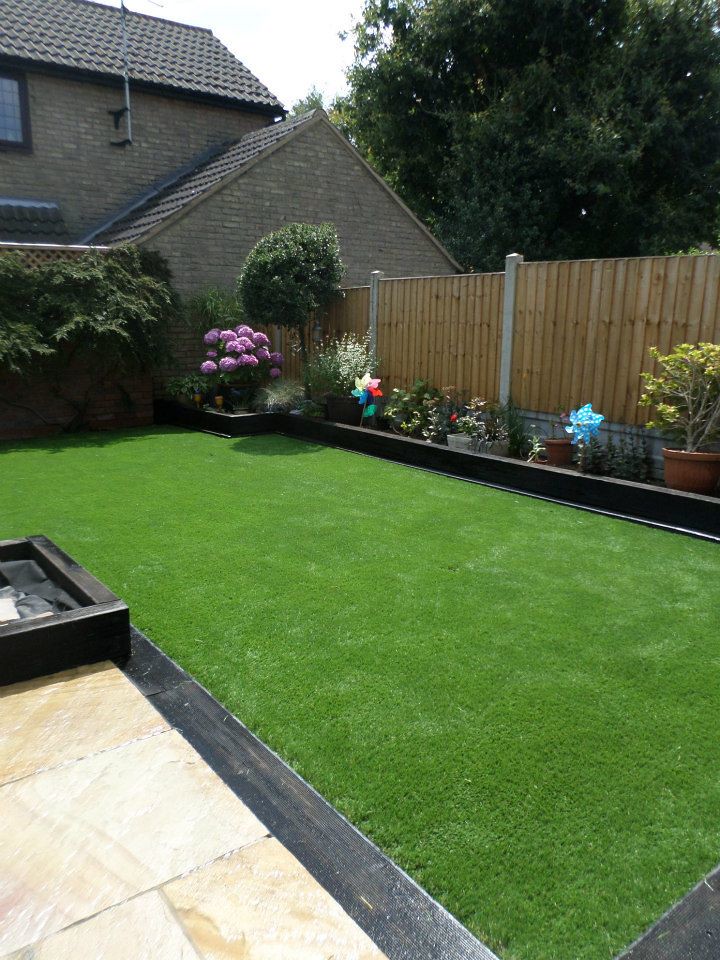 A fake grass lawn in a garden